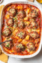 Baked Meatballs and Potatoes in Rich Tomato Sauce
