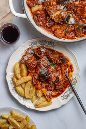 Greek pork with eggplant and cheese