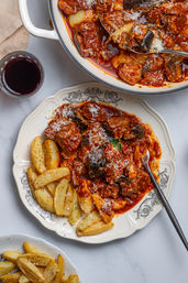 Greek pork with eggplant and cheese