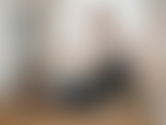 A physiotherapist guiding a patient through a clinical Pilates reformer session at Body Form.