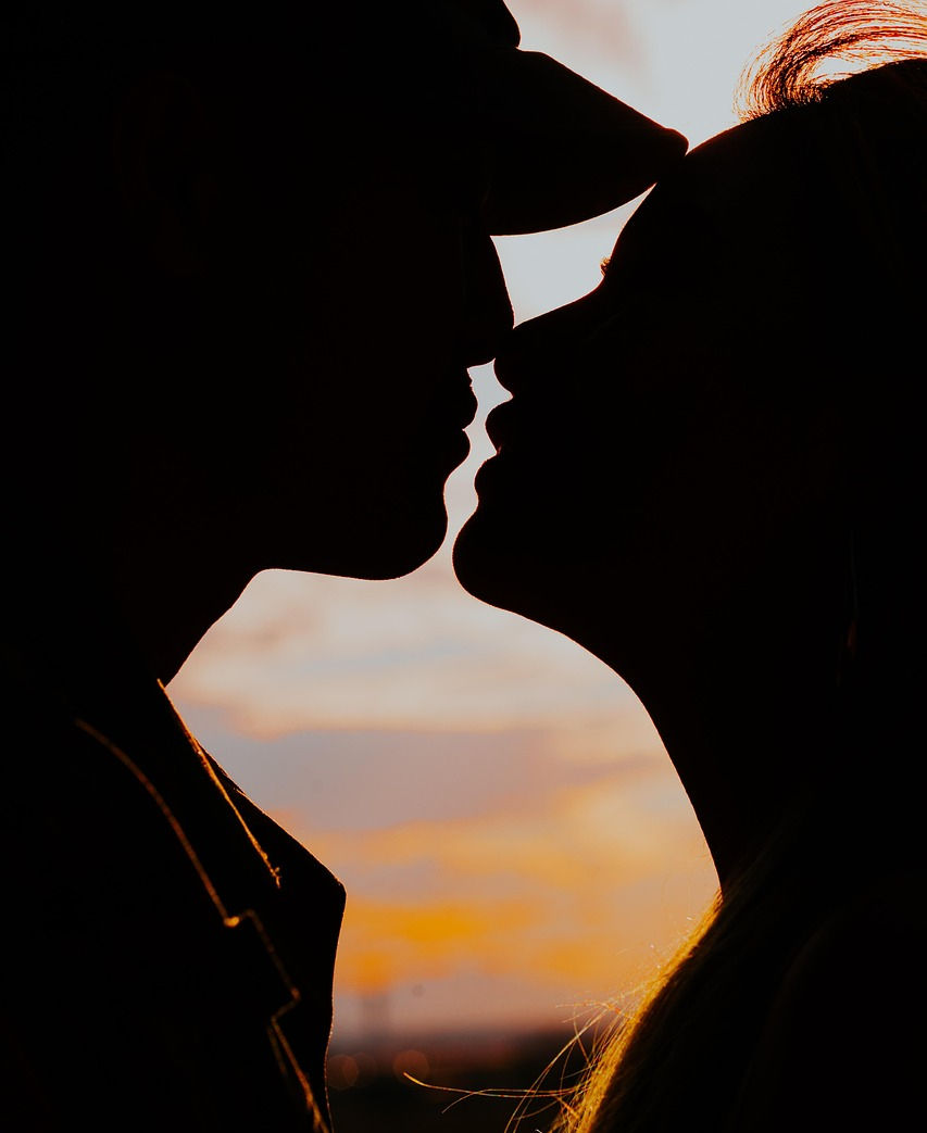 Couple in love in sun set, with sexual polarity