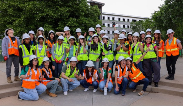 2026 High School Summer Institute attendees and mentors at a site tour.
