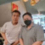 Japanese man receiving Thai massage treatment in Asoke