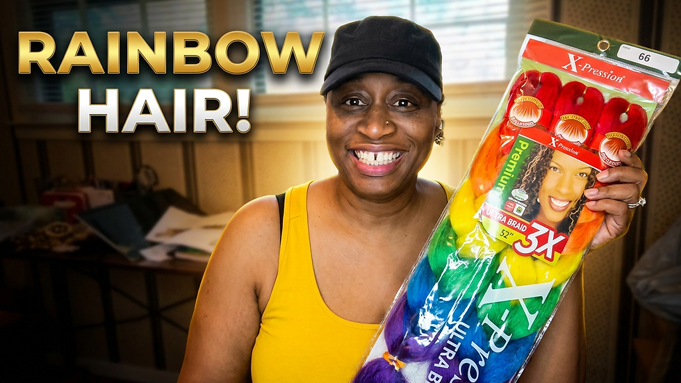 Smiling woman in yellow tank top holds X-Pression rainbow braid hair package; bold text says RAINBOW HAIR!