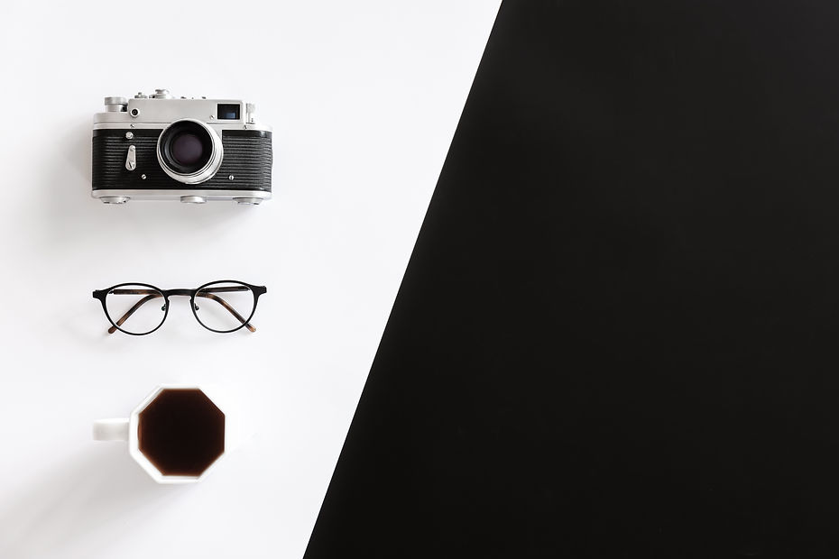 vintage-retro-camera-glasses-coffee-cup-black-white-background.jpg