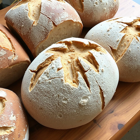 Artisanal bread, loaves of bread, unsliced bread.jpg
