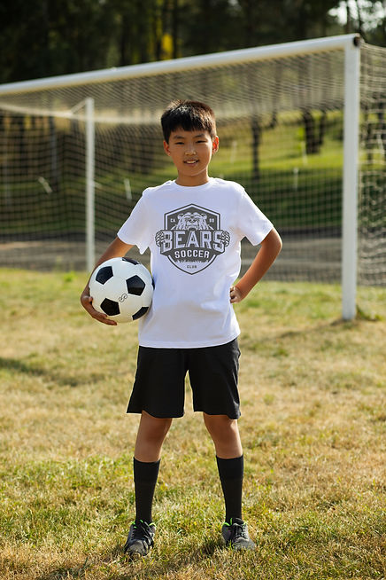 kids-playing-football-supervised-by-football-trainer copy.jpg