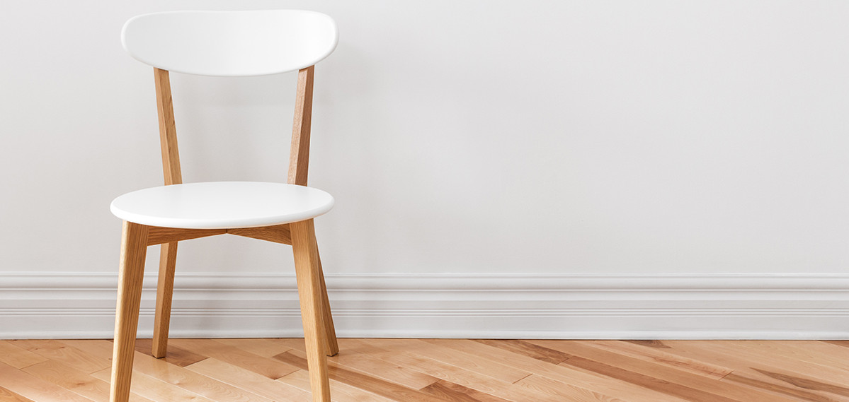 White Chair in an Empty Room