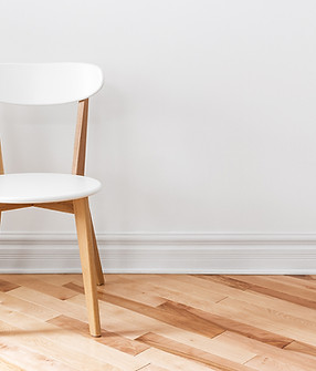White Chair in an Empty Room