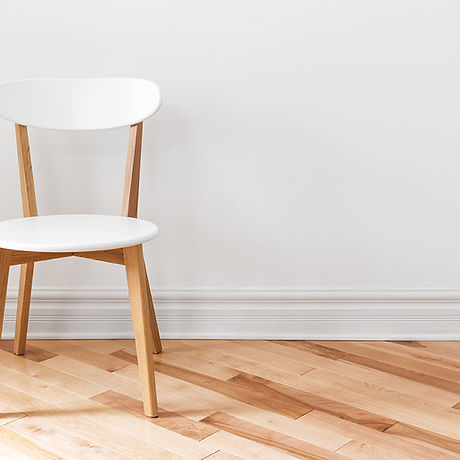 White Chair in an Empty Room