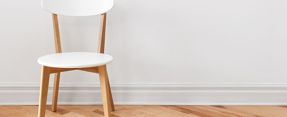 White Chair in an Empty Room