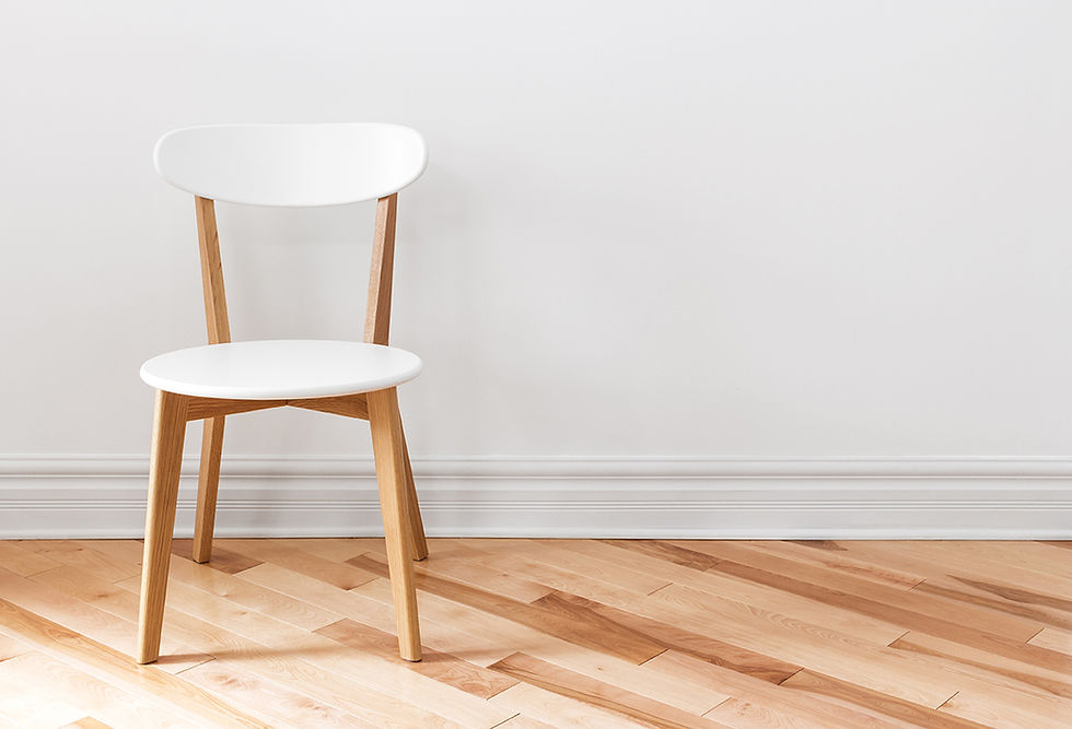 White Chair in an Empty Room