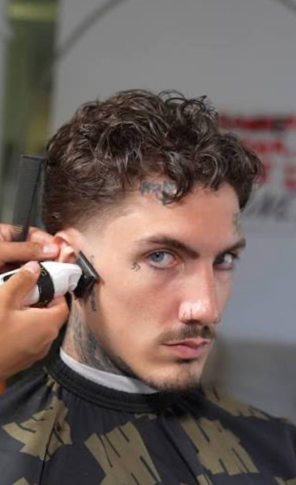 Close-up view of a barber chair at Ron the Barber NYC