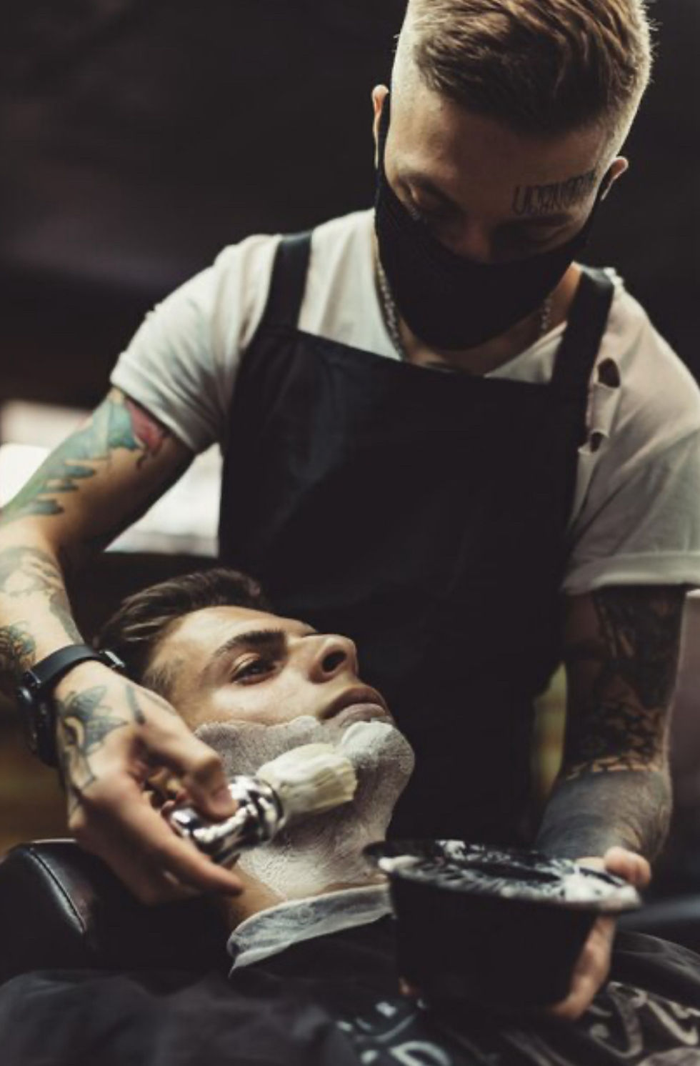 Eye-level view of Ron the Barbers NYC storefront