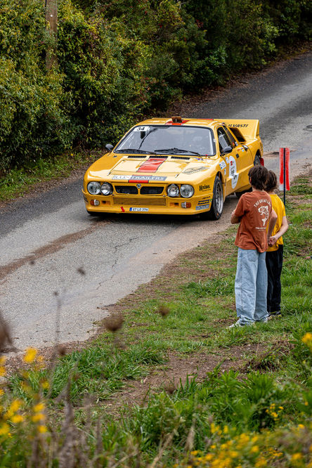 a yellow car with the number 34 on it