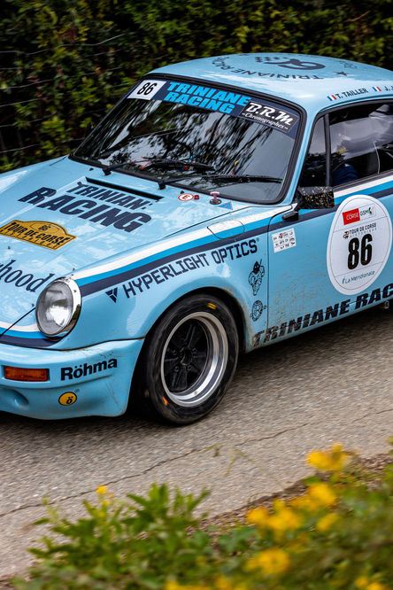 the number 86 is on the side of a car