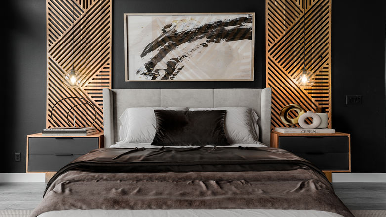 Close-up of bed and nightstands with sculptural decor and wood slat paneling against black wall