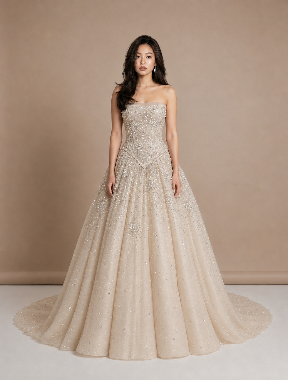 Front-view 3D simulation of a warm-ivory strapless basque-waist ball gown with dense celestial star embroidery concentrated on the corset and upper skirt, fading toward the hem and train.