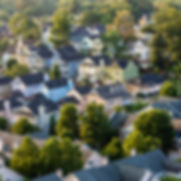 Aerial view of house roofs in suburban n