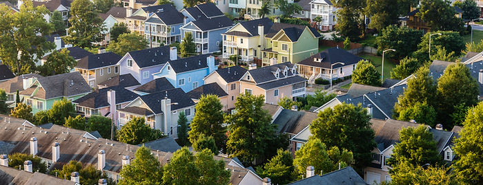 Aerial view of house roofs in suburban n
