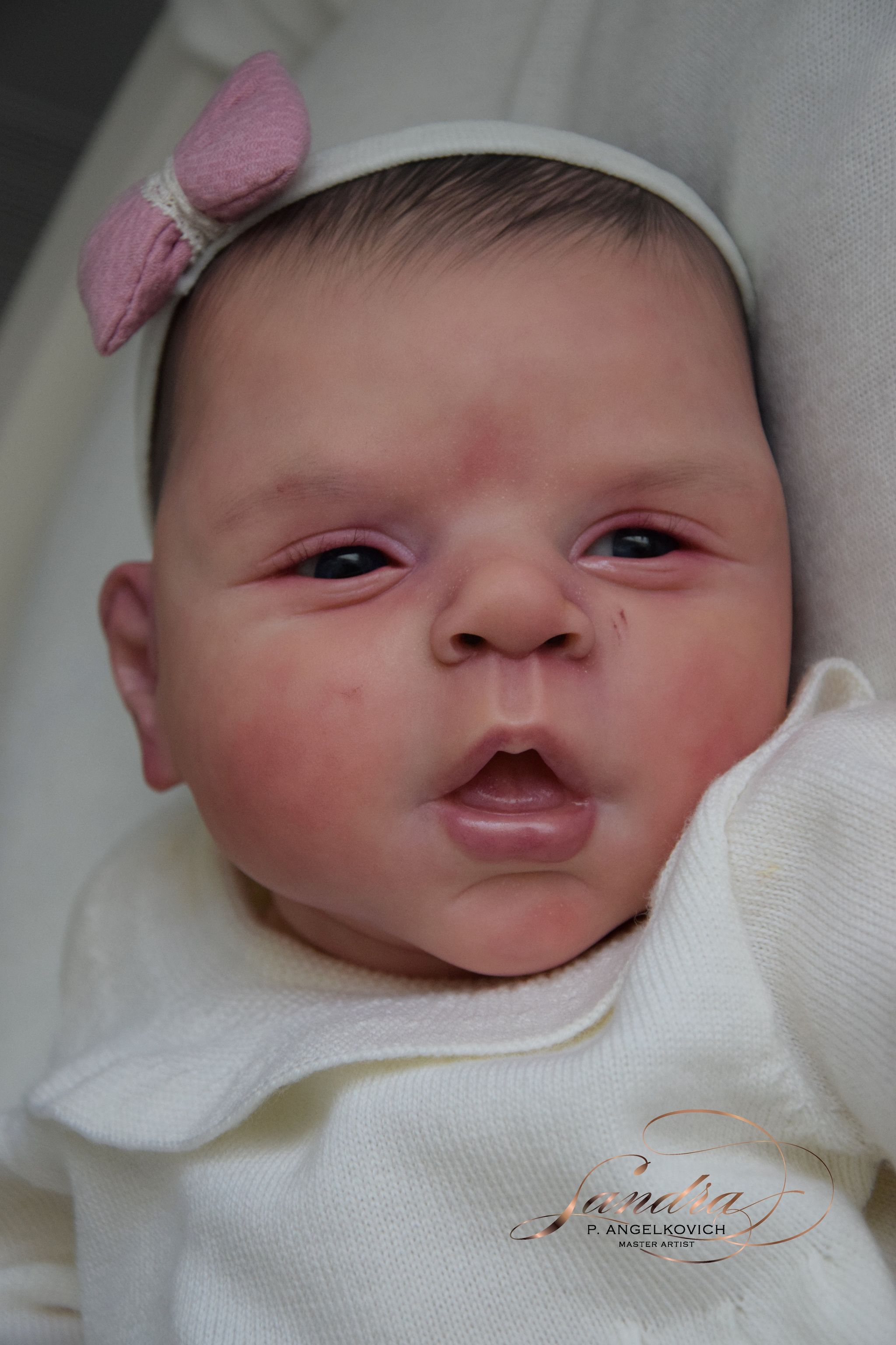 Alternate source-attributed photograph of Estella by Cassie Ann Love