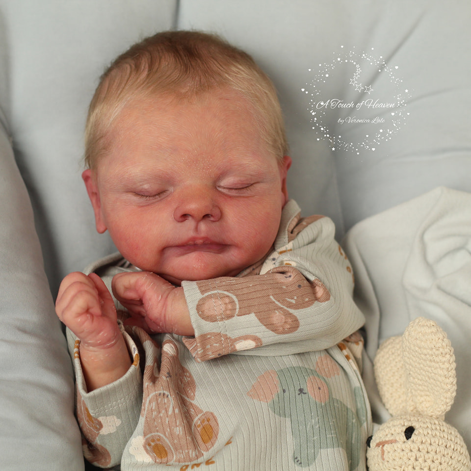 Lucas original reborn doll sculpt by Cassie Ann Love — source-attributed photograph 1 of 2