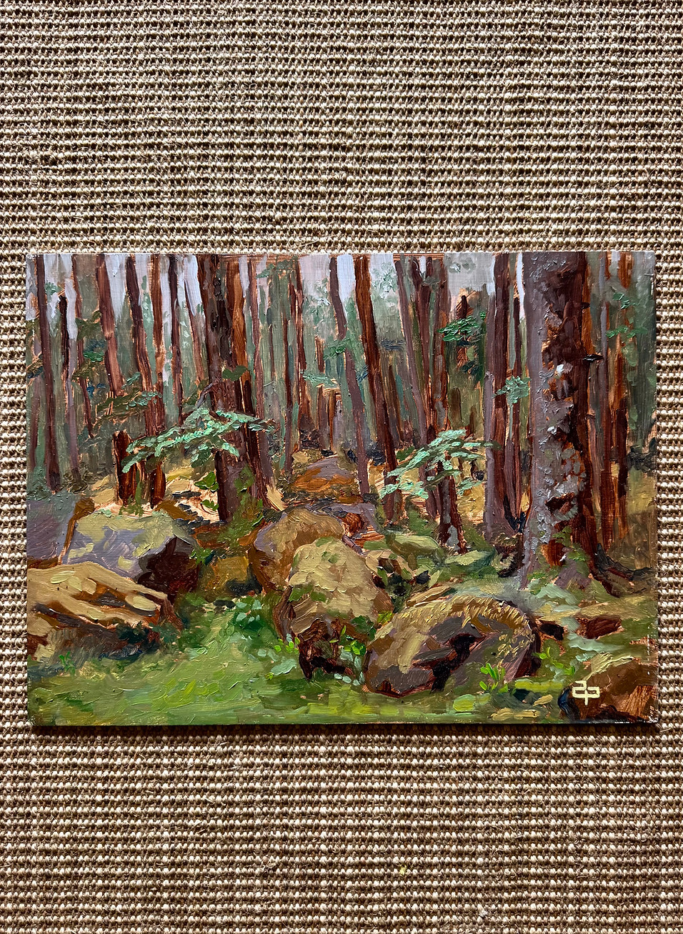 A painting of trees and woods.