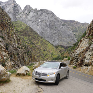 Kings Canyon Scenic Byway descending into the canyon with granite cliffs along the road