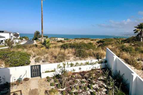 On the Ridge Back Garden, gate to walking trail. ocrean view