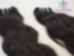 Close-up of premium Raw Indian Loose Wave human hair extensions showcasing soft texture, natural wave pattern, and healthy shine.