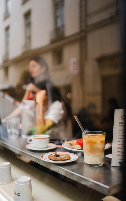 Coffee, iced latte, cookie at Parisian cafe