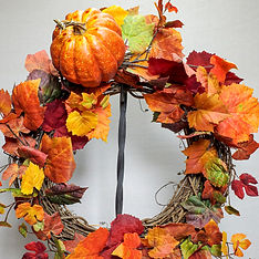 e6 Attach the pumpkin by placing the two