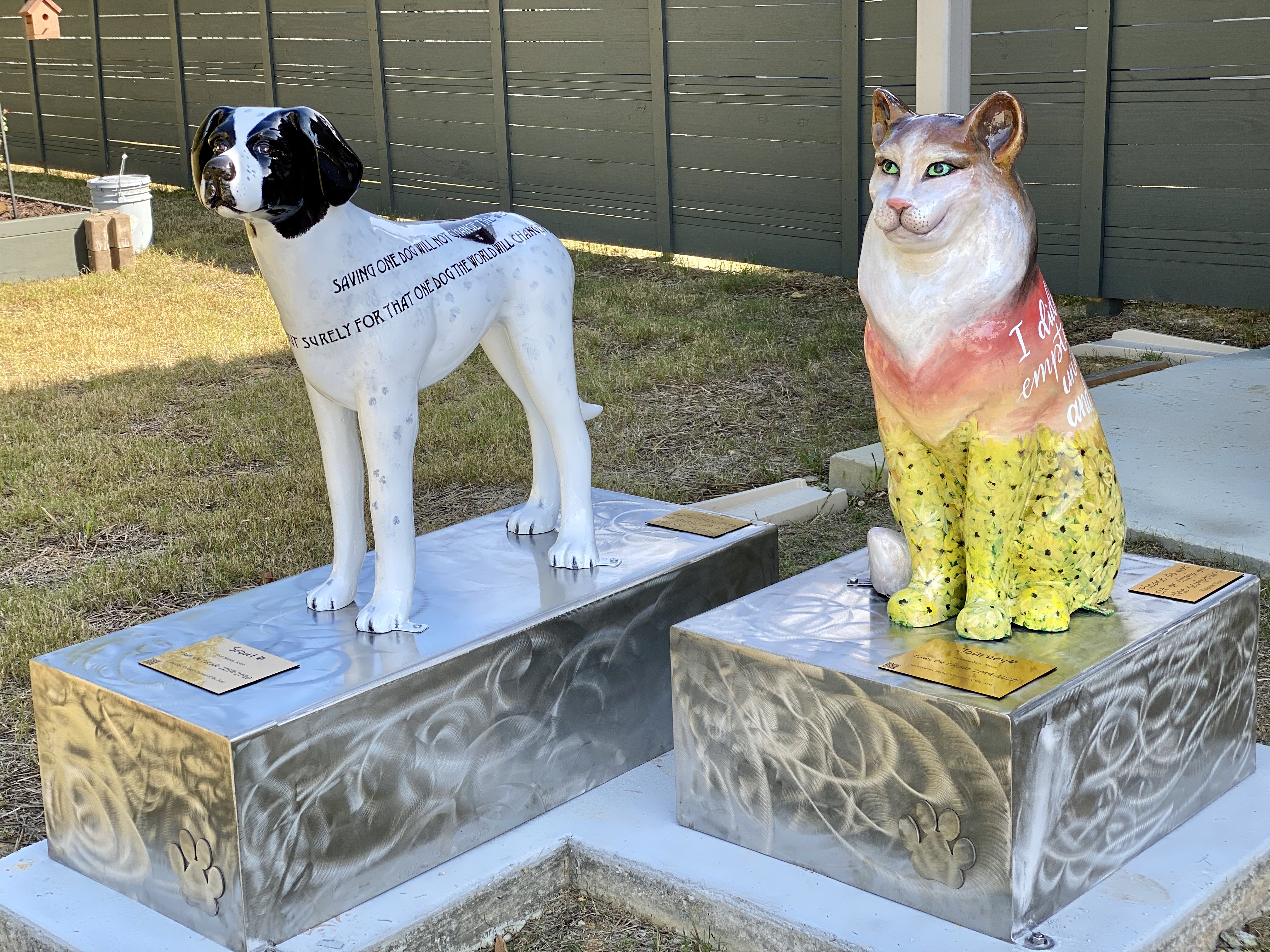 Beautiful dog and cat statues were created by artists Pook Bellini of LASS and Kristina Ray.