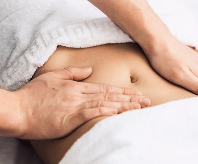 Massage of the stomach in the spa. Cosmetic clinic, spa, wellness center, healthcare conce