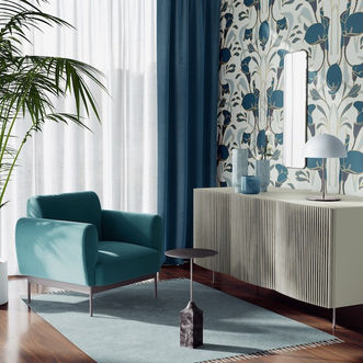 A lounge interior with Calla Lily repeat pattern in teal colour way as a wallpaper.