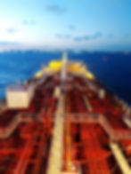 aerial-view-vessel-navigating-against-cloudy-sky.jpg