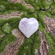 Lavender Quartz on grass and wood