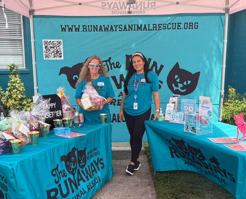 Volunteers caring for rescued animals at Runaways Animal Rescue in Pasco County Florida