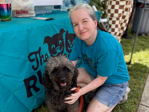 Volunteers caring for rescued animals at Runaways Animal Rescue in Pasco County Florida