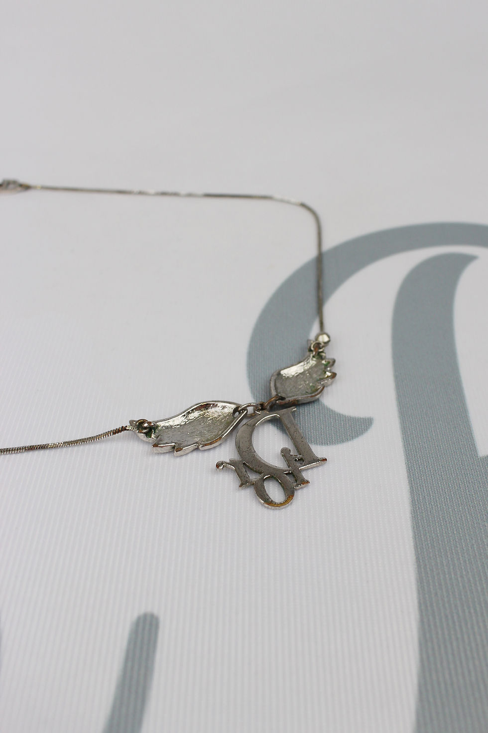 Thumbnail: Vintage Dior Angel Wings Logo Necklace