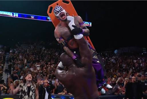 Omos confronts Rey Mysterio during the main event of AAA TripleMania 34 Night One.