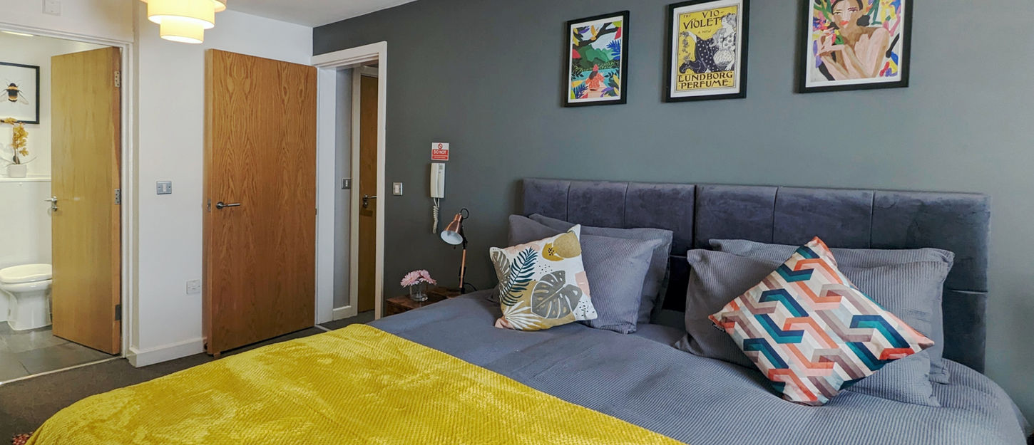 A beautifully decorated, softly furnished large spacious bedroom in a Coventry Serviced Apartment.