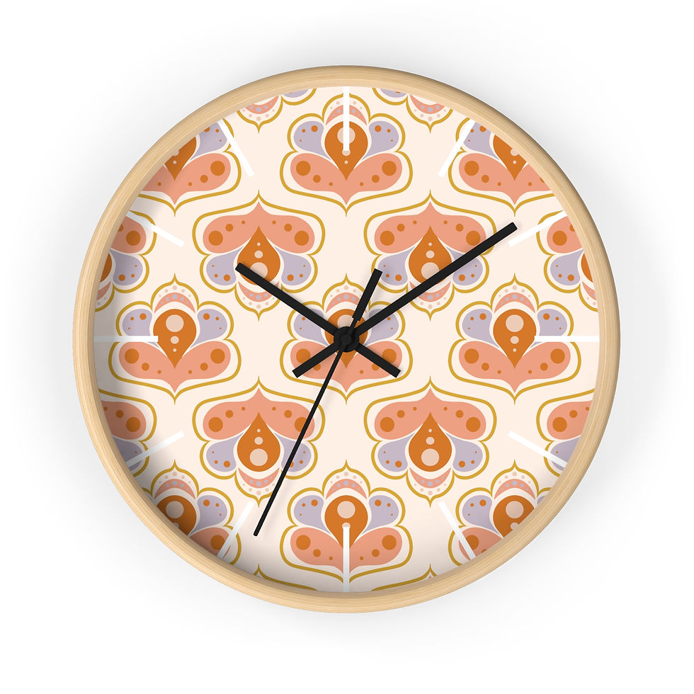 Colorful wall clock featuring a geometric floral pattern in shades of orange, pink, and purple.