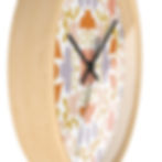 Boho wall clock with a vibrant floral pattern, adding a touch of free-spirited style to your modern home decor.