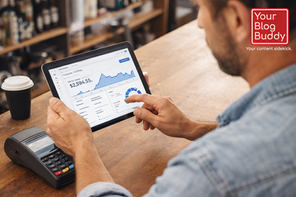 Business owner analyzing payment processing data on a tablet beside a card reader at a retail counter.
