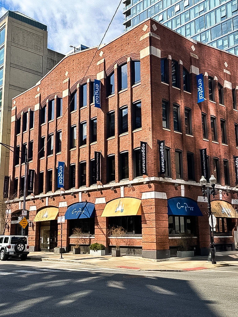 Engtal office building with brick facade and blue banners.