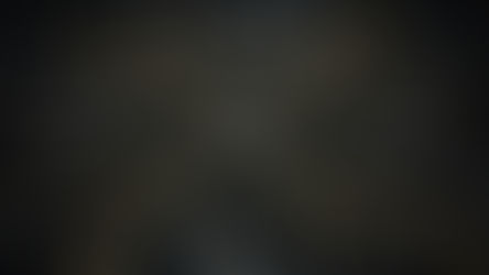 Abstract gold and white digital network lines radiating from a central core representing Wix Studio e-commerce redesign