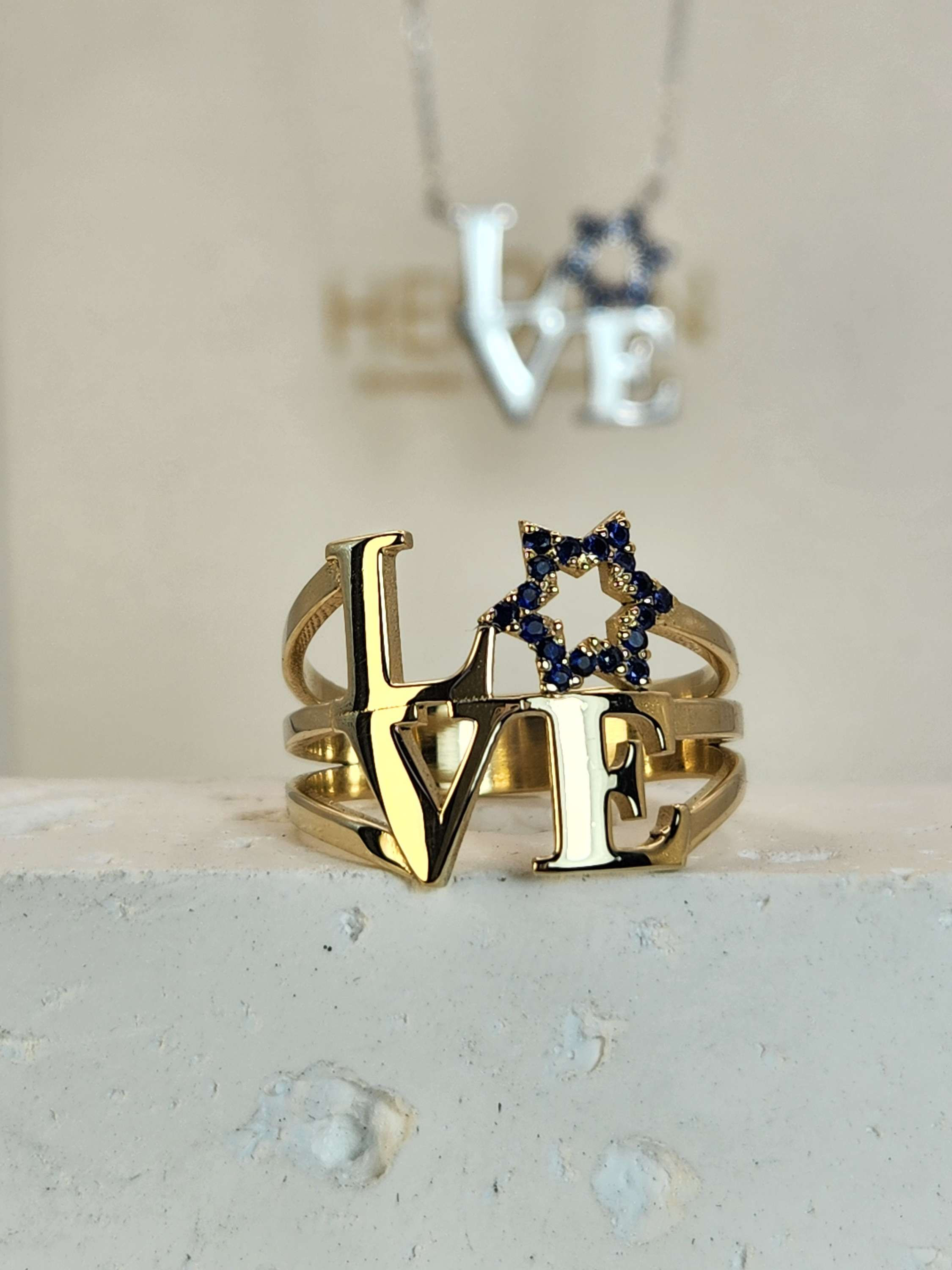 Love ring 14k gold set with blue natural sapphires 