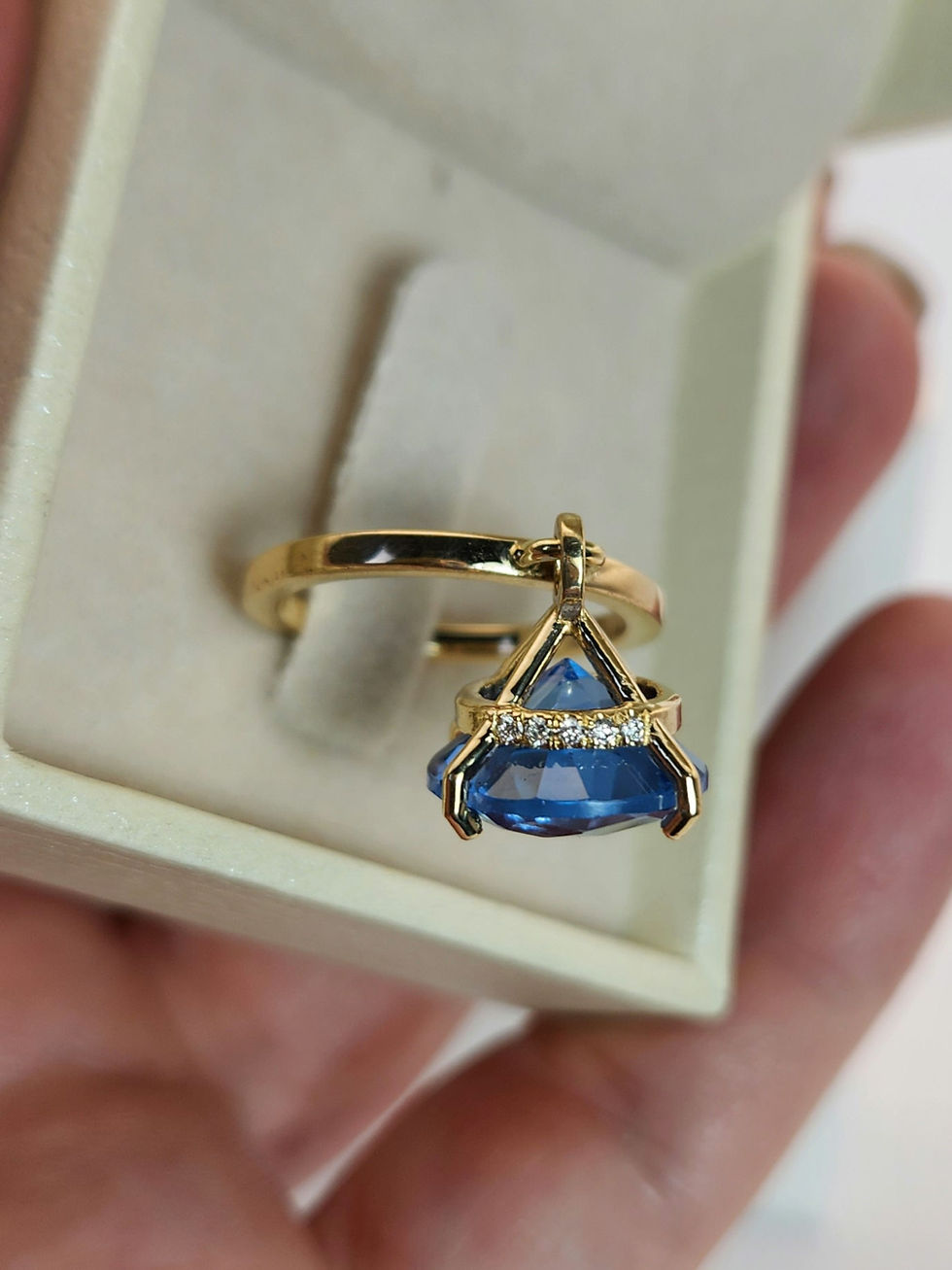 Thumbnail: Dangling ring with blue topaz and diamonds