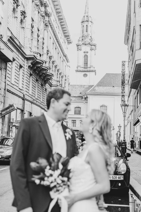 "Couple enjoying a May Budapest Elopement with a Spanish speaking Celebrant during a romantic stroll through Pest."
